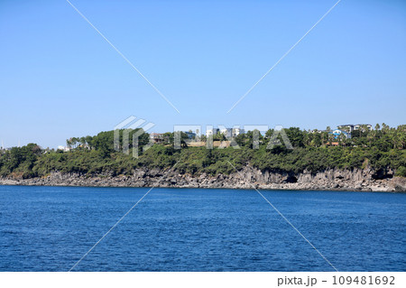 This is a beautiful view of the Seogwipo coast, a famous tourist attraction in Korea. This is a beautiful view of the Seogwipo coast, a famous tourist attraction in Korea. 109481692