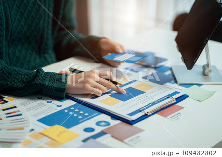 Creative male web designer planning application development for web mobile phone at modern workplace. Creative male web designer planning application development for web mobile phone at modern workplace. 109482802