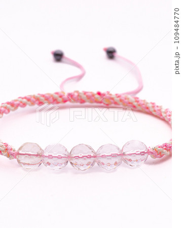 Woman hand with bracelets show thumb up symbol isolated on white background ,clipping path included for design. 109484770