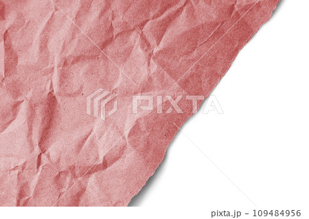 Recycled crumpled red paper texture with a diagonal torn edge isolated on white background 109484956