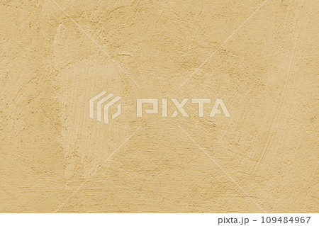 Stucco plaster surface, brushstroke background texture of yellow painted cement, concrete wall Stucco plaster surface, brushstroke background texture of yellow painted cement, concrete wall 109484967
