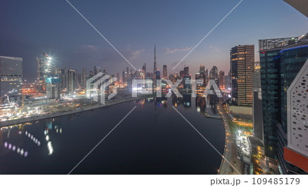 Aerial panorama of Dubai Business Bay and Downtown with the various skyscrapers and towers night to day timelapse Aerial panorama of Dubai Business Bay and Downtown with the various skyscrapers and towers night to day timelapse 109485179
