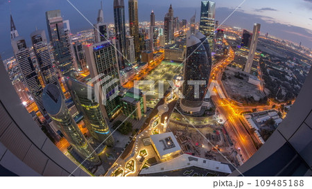 Skyline panorama of the high-rise buildings on Sheikh Zayed Road in Dubai aerial night to day timelapse, UAE. 109485188