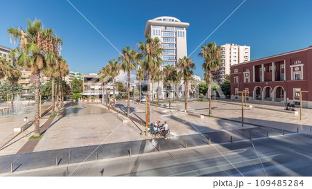 Panorama showing aerial view of the fountains and palms on the main square Sheshi Liria in Durres timelapse, Albania 109485284