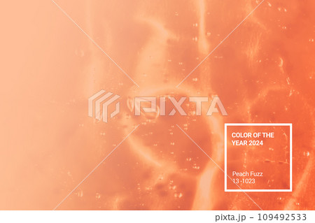 Color 2024 Peach fuzz. Texture of transparent antiseptic gel with air bubbles. Skin care concept. Liquid beauty product closeup. Abstract background, an ideal backdrop for design presentation 109492533