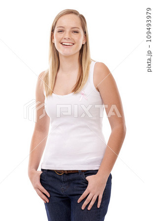 Happy portrait, breast cancer ribbon and woman smile for studio recovery, awareness campaign or support. Survivor empowerment, health sign or pride in disease recognition movement on white background Happy portrait, breast cancer ribbon and woman smile for studio recovery, awareness campaign or support. Survivor empowerment, health sign or pride in disease recognition movement on white background 109493979