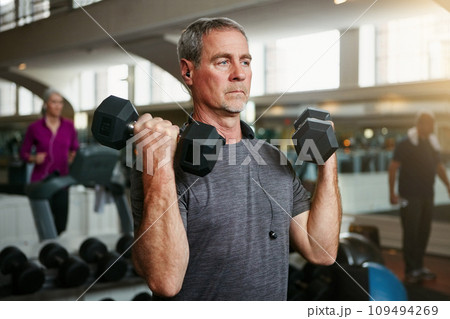 Senior fitness, old man and dumbbells at a gym for weightlifting, challenge or workout, training or bodybuilding. Biceps, arms and elderly person with hand weight for strength, mindset or exercise Senior fitness, old man and dumbbells at a gym for weightlifting, challenge or workout, training or bodybuilding. Biceps, arms and elderly person with hand weight for strength, mindset or exercise 109494269