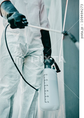 Covid pandemic outbreak cleaner and healthcare worker in protective ppe to prevent spread of virus outside. Professional in hazmat suit cleaning and disinfecting the street or building for hygiene 109494273