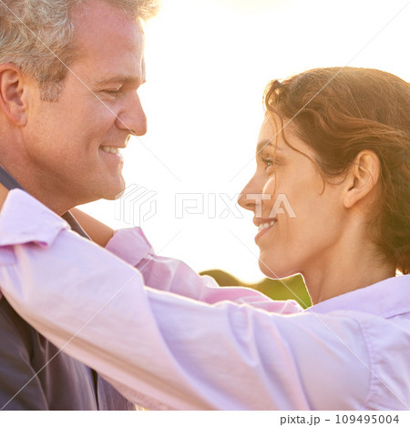 Old couple, smile and embrace at sunset with love, trust and support in marriage and retirement. Happy, woman and care for partner on holiday with freedom, health and wellness at the beach for cruise Old couple, smile and embrace at sunset with love, trust and support in marriage and retirement. Happy, woman and care for partner on holiday with freedom, health and wellness at the beach for cruise 109495004