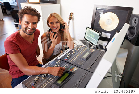 Recording studio, music and portrait of producer for collaboration on song, track and radio. Technology, digital musician and happy man and woman for sound engineer or technician for media production Recording studio, music and portrait of producer for collaboration on song, track and radio. Technology, digital musician and happy man and woman for sound engineer or technician for media production 109495197