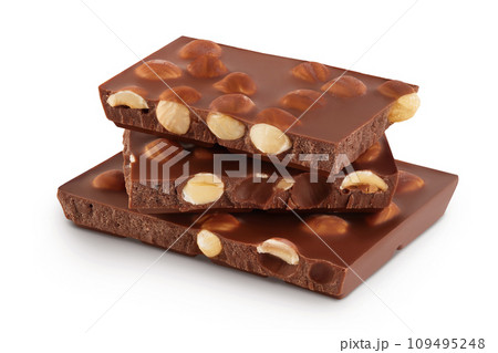 Chocolate with hazelnuts isolated on white background with full depth of field. Chocolate with hazelnuts isolated on white background with full depth of field. 109495248