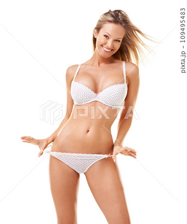 Underwear, confidence and portrait of woman in studio with pride, beauty and skincare on white background. Wellness mockup, smile and isolated person in lingerie for health, sensual and flirting 109495483
