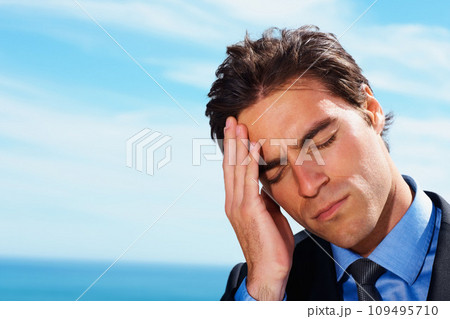 Headache, sky and face of business man sad, tired or stress over corporate mistake, company disaster or agency fail. Mockup space, migraine pain and closeup professional person depressed over crisis Headache, sky and face of business man sad, tired or stress over corporate mistake, company disaster or agency fail. Mockup space, migraine pain and closeup professional person depressed over crisis 109495710