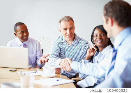 Business people, handshake and partnership with meeting success, b2b deal and onboarding or thank you. Professional manager, clients or mature boss shaking hands with team agreement and negotiation Business people, handshake and partnership with meeting success, b2b deal and onboarding or thank you. Professional manager, clients or mature boss shaking hands with team agreement and negotiation 109496022