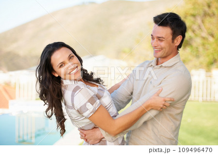 Couple, dancing and outdoor with happiness, love and honeymoon for fun, romantic and smile. Relationship, bonding together and smiling for marriage, young and dance with face, joy and romance Couple, dancing and outdoor with happiness, love and honeymoon for fun, romantic and smile. Relationship, bonding together and smiling for marriage, young and dance with face, joy and romance 109496470