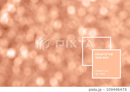 Demonstrating color 2024 Peach Buzz. Abstract bokeh background. Light pastel beige wallpaper. Bright blurred shimmering garland in soft focus. Trendy backplate for web design projects 109496478