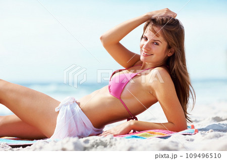 Portrait, smile and woman in bikini relax at beach blanket on holiday, vacation or travel. Body, happy girl and swimwear at ocean, sand and sea for freedom, tropical summer or beauty mockup in Hawaii Portrait, smile and woman in bikini relax at beach blanket on holiday, vacation or travel. Body, happy girl and swimwear at ocean, sand and sea for freedom, tropical summer or beauty mockup in Hawaii 109496510