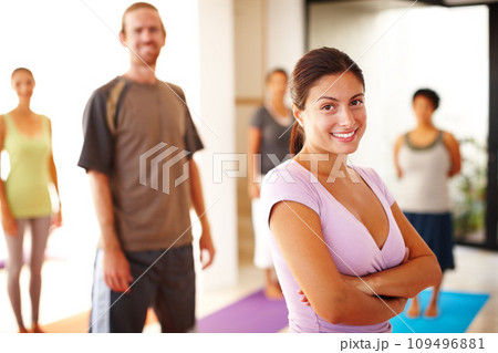 Portrait, smile and confidence, woman in yoga class for fitness, commitment and body wellness. Pilates, men and women in gym together in holistic health, mindfulness and happy person at exercise club 109496881