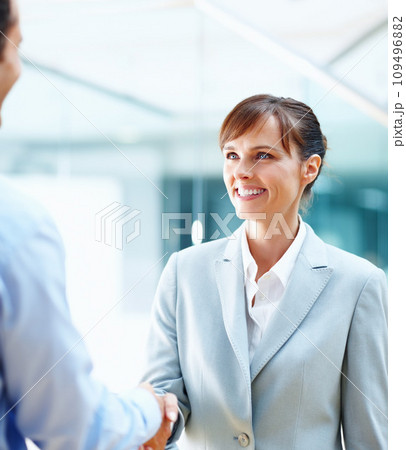Business woman, handshake and meeting for partnership, professional introduction and hello in a law firm. Corporate lawyer, people or clients shaking hands for legal success, thank you and consulting 109496882