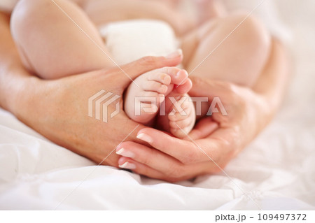 Woman, child and feet closeup for love connection or childhood bonding, motherhood or newborn. Female person, infant and toes or care support for kid growth development, parent trust or nurture youth Woman, child and feet closeup for love connection or childhood bonding, motherhood or newborn. Female person, infant and toes or care support for kid growth development, parent trust or nurture youth 109497372