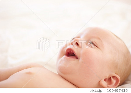 Baby, smile on bed and funny laugh of young child in development, innocent and relax at home. Happy kid, excited infant in nursery and rest in bedroom, healthy body and cute, adorable or mockup space Baby, smile on bed and funny laugh of young child in development, innocent and relax at home. Happy kid, excited infant in nursery and rest in bedroom, healthy body and cute, adorable or mockup space 109497436