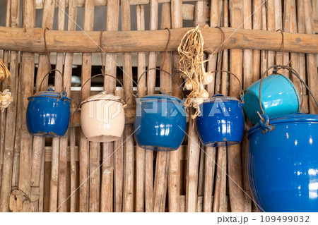A traditional Asian kitchen wall pot for storing food. 109499032