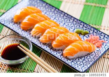 Sushi set of nigiri, served on rectangular plate Sushi set of nigiri, served on rectangular plate 109503455