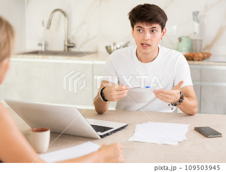 Guy manager tells woman client about specifics of design of microloan, about benefits and advantages Guy manager tells woman client about specifics of design of microloan, about benefits and advantages 109503945