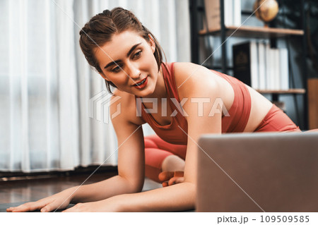 Flexible and dexterity woman in sportswear doing reverse gaiety yoga position Flexible and dexterity woman in sportswear doing reverse gaiety yoga position 109509585