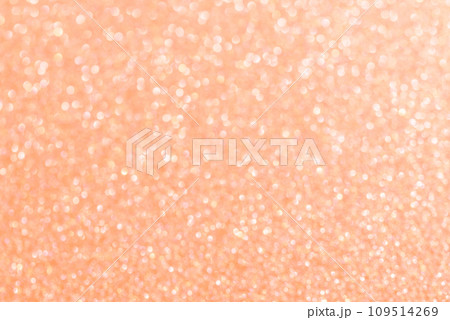 Color of the Year 2024 Peach Fuzz Abstract background. Glitter texture christmas background. Defocused abstract holidays lights on background. Color of the Year 2024 Peach Fuzz Abstract background. Glitter texture christmas background. Defocused abstract holidays lights on background. 109514269