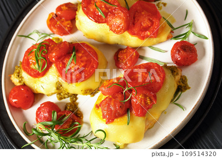 Pesto Tomato Cheese Chicken Breast, top view Pesto Tomato Cheese Chicken Breast, top view 109514320