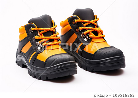 Pair of orange safety leather shoes isolated on white background. Work shoes for men in factory or industry to protect foot from accident. Safety footwear. Oil and acid resistant shoes. Generative AI 109516865