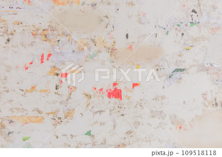 Old dirty tattered paper bulletin board surface texture background Old dirty tattered paper bulletin board surface texture background 109518118