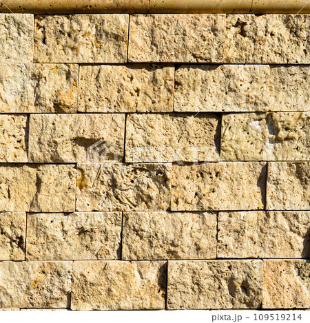 Cutting beige marble wall rectangular, seamless lined up 109519214