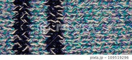 Handmade knitted fabric blue and white wool background texture Handmade knitted fabric blue and white wool background texture 109519296