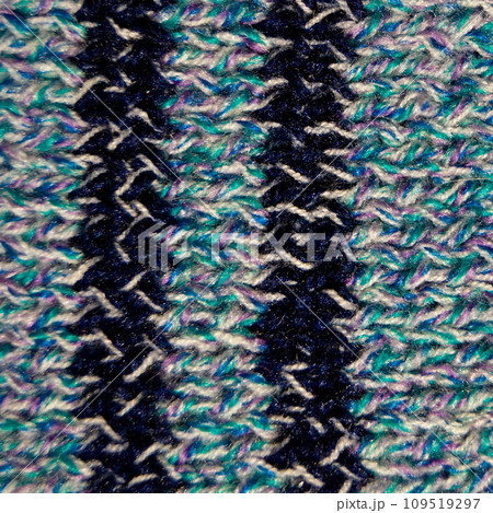 Handmade knitted fabric blue and white wool background texture Handmade knitted fabric blue and white wool background texture 109519297