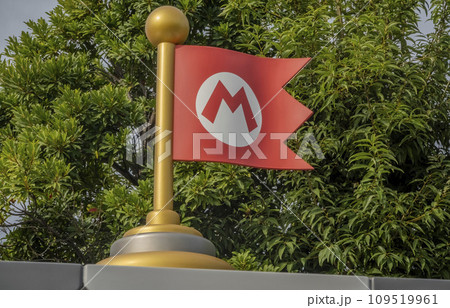Osaka, Japan. Nov 14, 2023. Close up to Mario Bros flag at the Super Nintendo World a themed area at Universal Studios Japan. 109519961