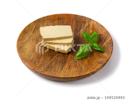Tofu Cheese Isolated, Smoked Vegan Cheese Slice, Sliced Soya Bean Curd, Soy Protein or TSP 109520993