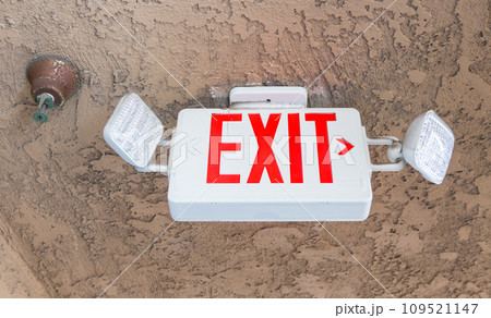 red exit sign on the sand celling  109521147