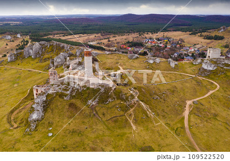 Aerial view of ruined medieval fortified Olsztyn Castle located in Krakow-Czestochowa Upland on Trail of Eagles Nests on spring day, Poland Aerial view of ruined medieval fortified Olsztyn Castle located in Krakow-Czestochowa Upland on Trail of Eagles Nests on spring day, Poland 109522520