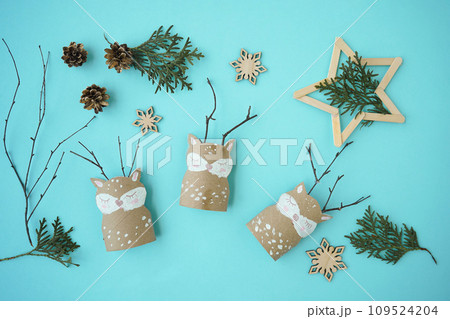 Decorations for Christmas party from toilet roll. Easy eco-friendly DIY master class, craft for kids. Development imagination and sensory motor skills Decorations for Christmas party from toilet roll. Easy eco-friendly DIY master class, craft for kids. Development imagination and sensory motor skills 109524204