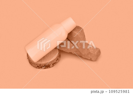 Peach fuzz is color of year 2024 tinted image A white plastic jar of cosmetic product stands on a stone podium flowers on a pink background. Bio cosmetics mock up Peach fuzz is color of year 2024 tinted image A white plastic jar of cosmetic product stands on a stone podium flowers on a pink background. Bio cosmetics mock up 109525981