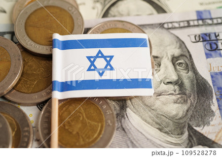 Israel flag on coin and banknote money, finance trading investment business currency concept. Israel flag on coin and banknote money, finance trading investment business currency concept. 109528278