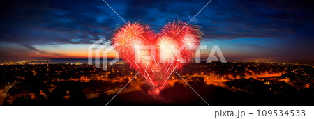 Heart-Shaped Fireworks: A fireworks display in the shape of a heart lighting up the night sky. Heart-Shaped Fireworks: A fireworks display in the shape of a heart lighting up the night sky. 109534533