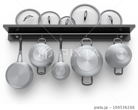 Set of stewpot, frying pan and chrome plated cookware hanging on shelf on white Set of stewpot, frying pan and chrome plated cookware hanging on shelf on white 109536288