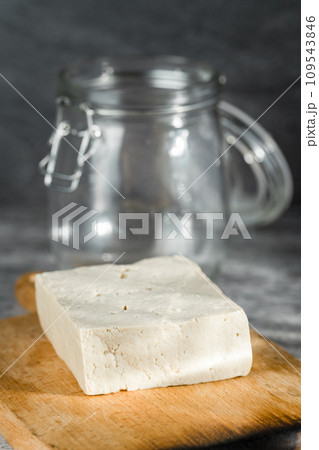Tofu on plate with black background Tofu on plate with black background 109543846
