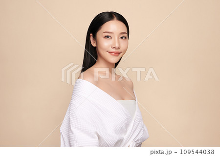 Beautiful young asian woman with clean fresh skin on beige background, Face care, Facial treatment, Cosmetology, beauty and spa, Asian women portrait. 109544038