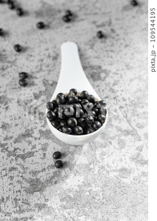Black beans on gray background 109544195