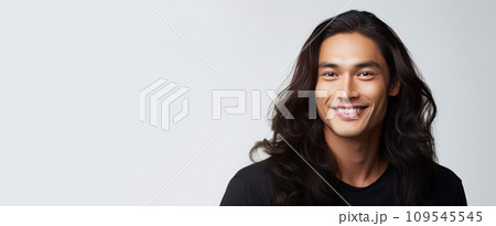 Elegant handsome smiling young male Asian guy with long hair, on white background, banner 109545545