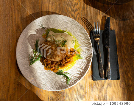 Breaded Meat Cutlets with Mashed Potatoes and Stewed Cabbage Garnish, Restaurant Main Course Breaded Meat Cutlets with Mashed Potatoes and Stewed Cabbage Garnish, Restaurant Main Course 109548990